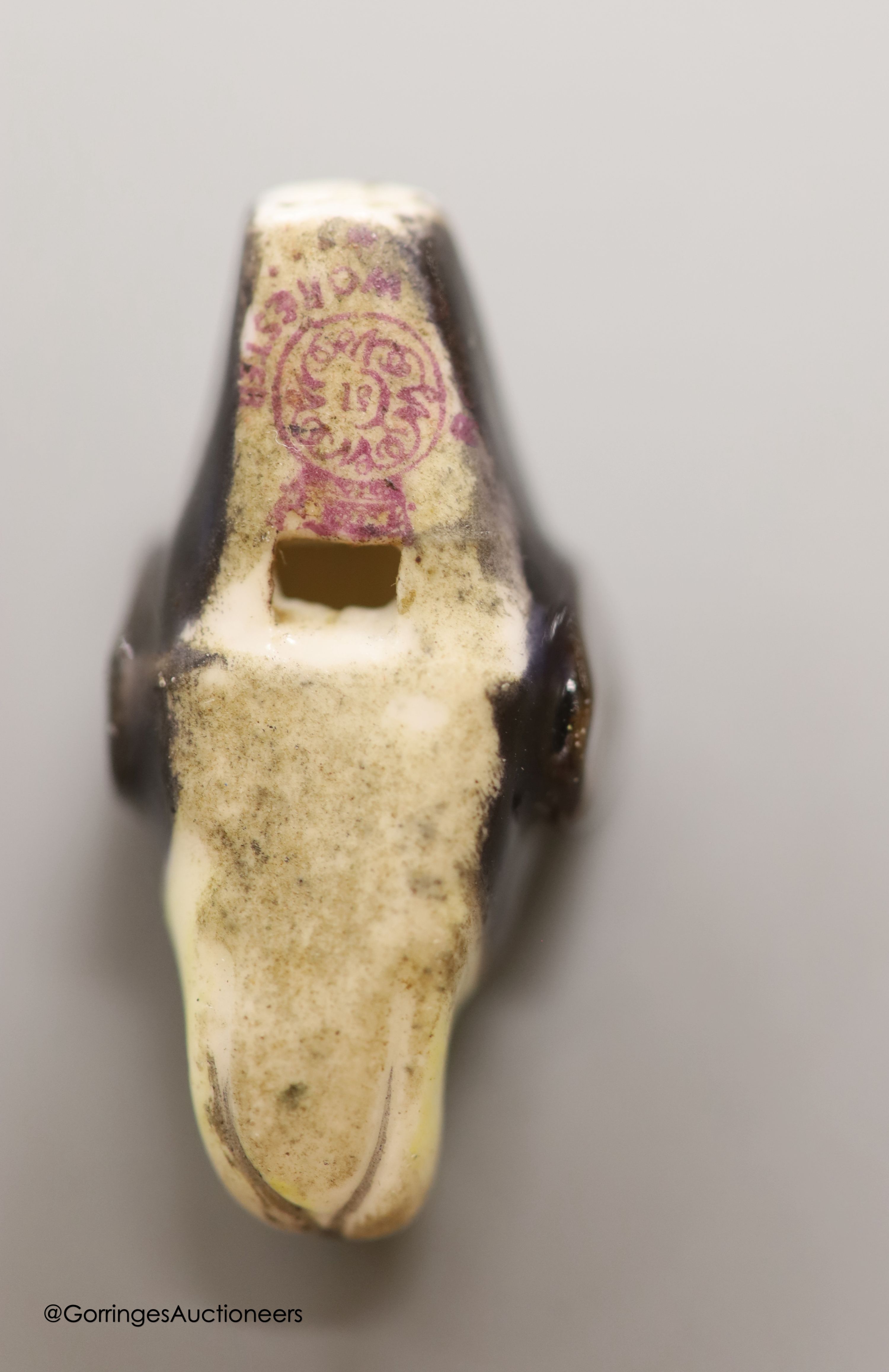A Royal Worcester beagle head whistle
